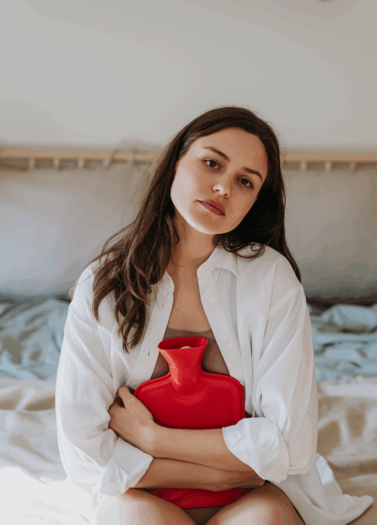 Woman,At,Home,Suffering,From,Menstrual,Pain,,Having,Cramps.,Woman